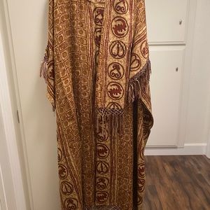 Kraftan with head wrap or can use to wrap around waist